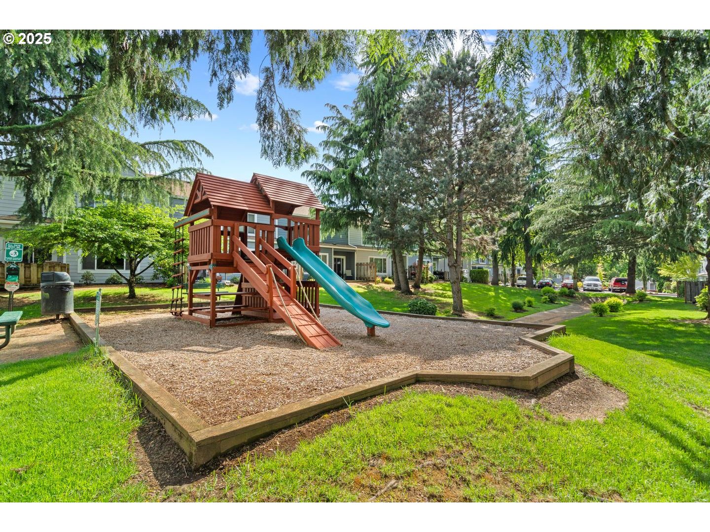 7143 Southwest Sagert Street, Unit 104 Tualatin, OR 97062 - Photo 32 of 33 a view of a park with slide