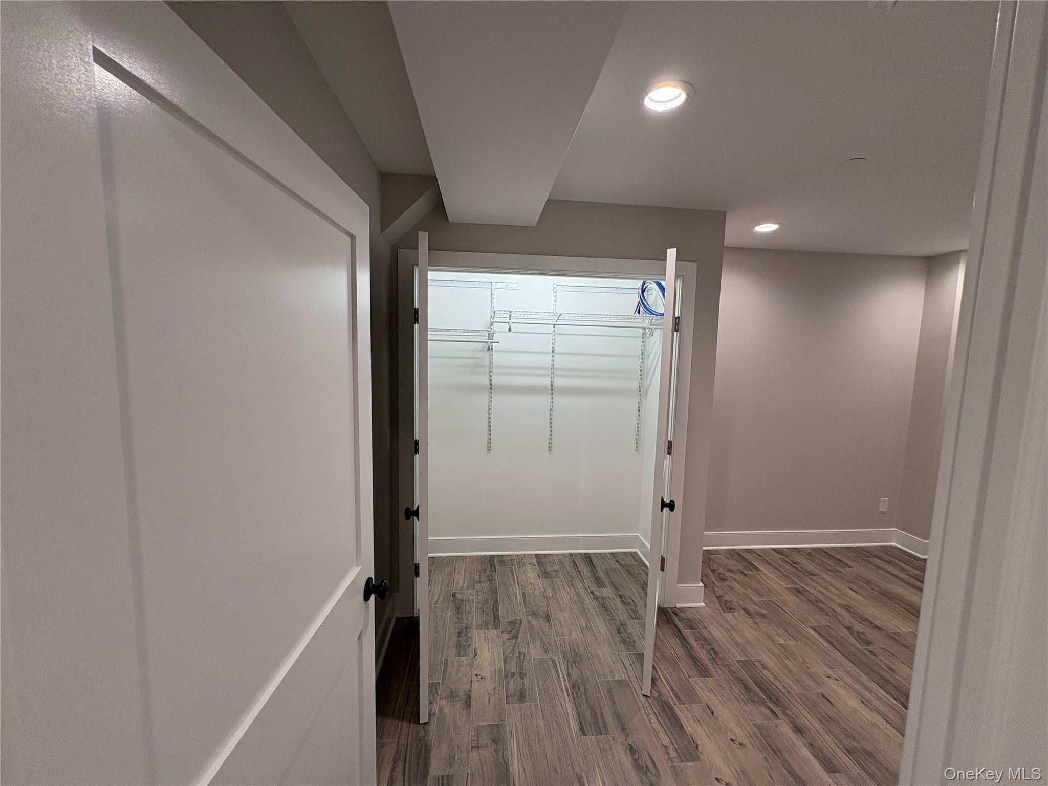 455 Sunrise Highway, Unit 1A West Babylon, NY 11704 - Photo 9 of 15 wooden floor in an empty room with wooden floor