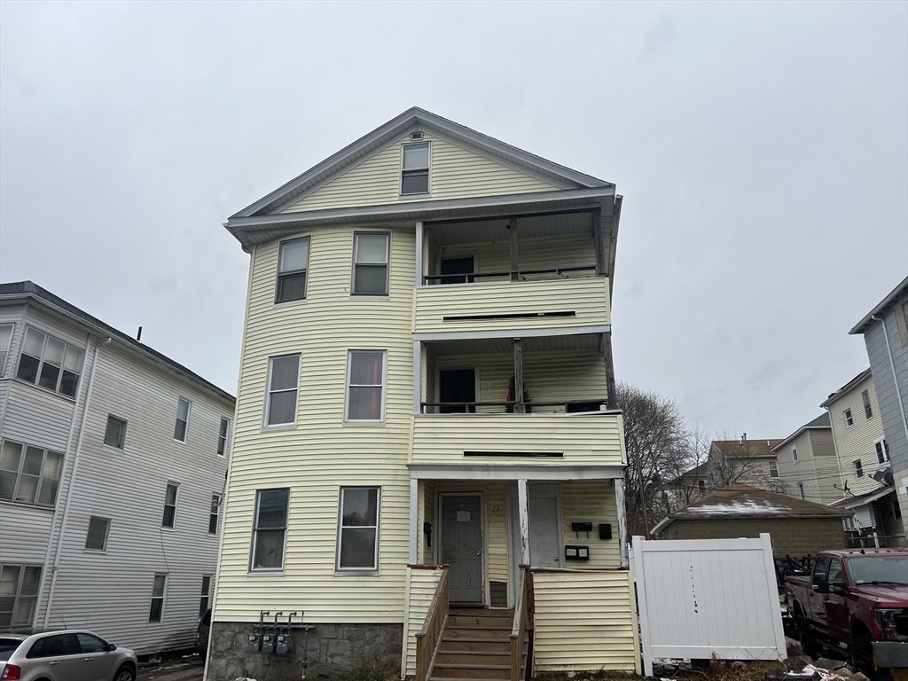 a front view of a house with a balcony