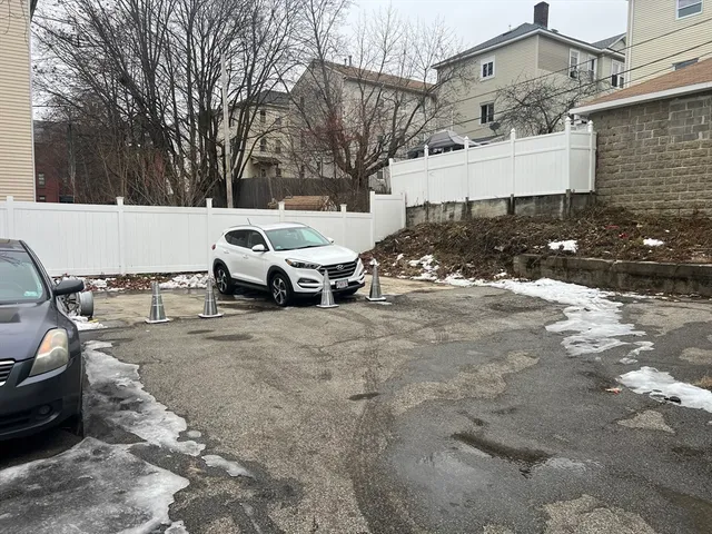 a car parked in front of a house