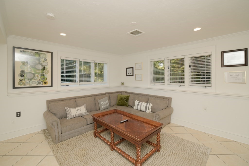 885 Randolph Street Canton, MA 02021 - Photo 27 of 40 a living room with furniture and windows