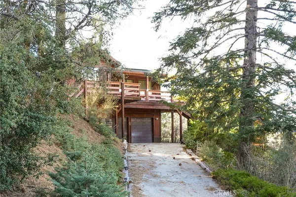 front view of a house with a trees