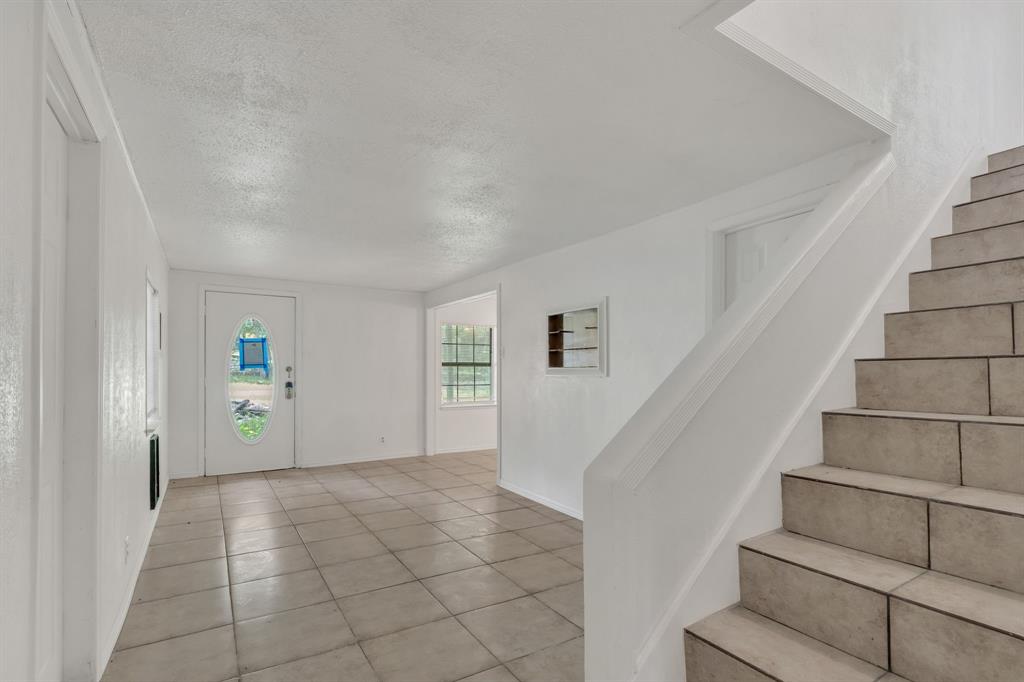 84 Natchez Road Pottsboro, TX 75076 - Photo 13 of 37 a view of an entryway with stairs