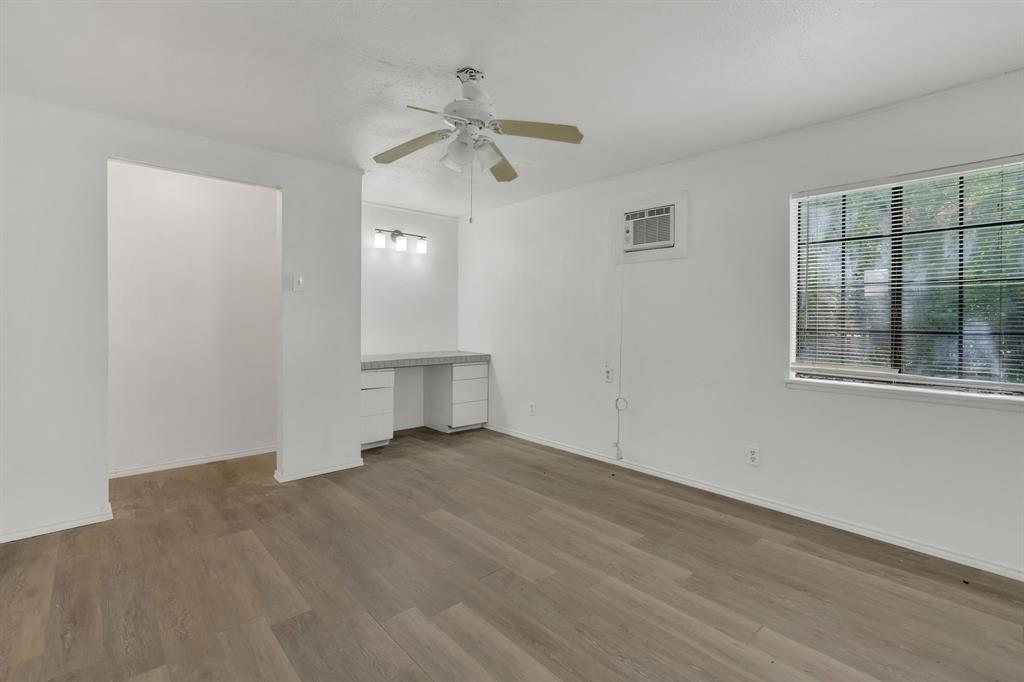 84 Natchez Road Pottsboro, TX 75076 - Photo 17 of 37 a view of an empty room with a window
