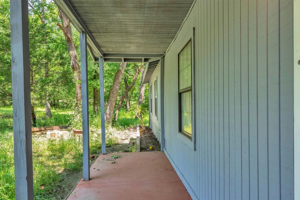 84 Natchez Road Pottsboro, TX 75076 - Photo 4 of 37 a view of a porch