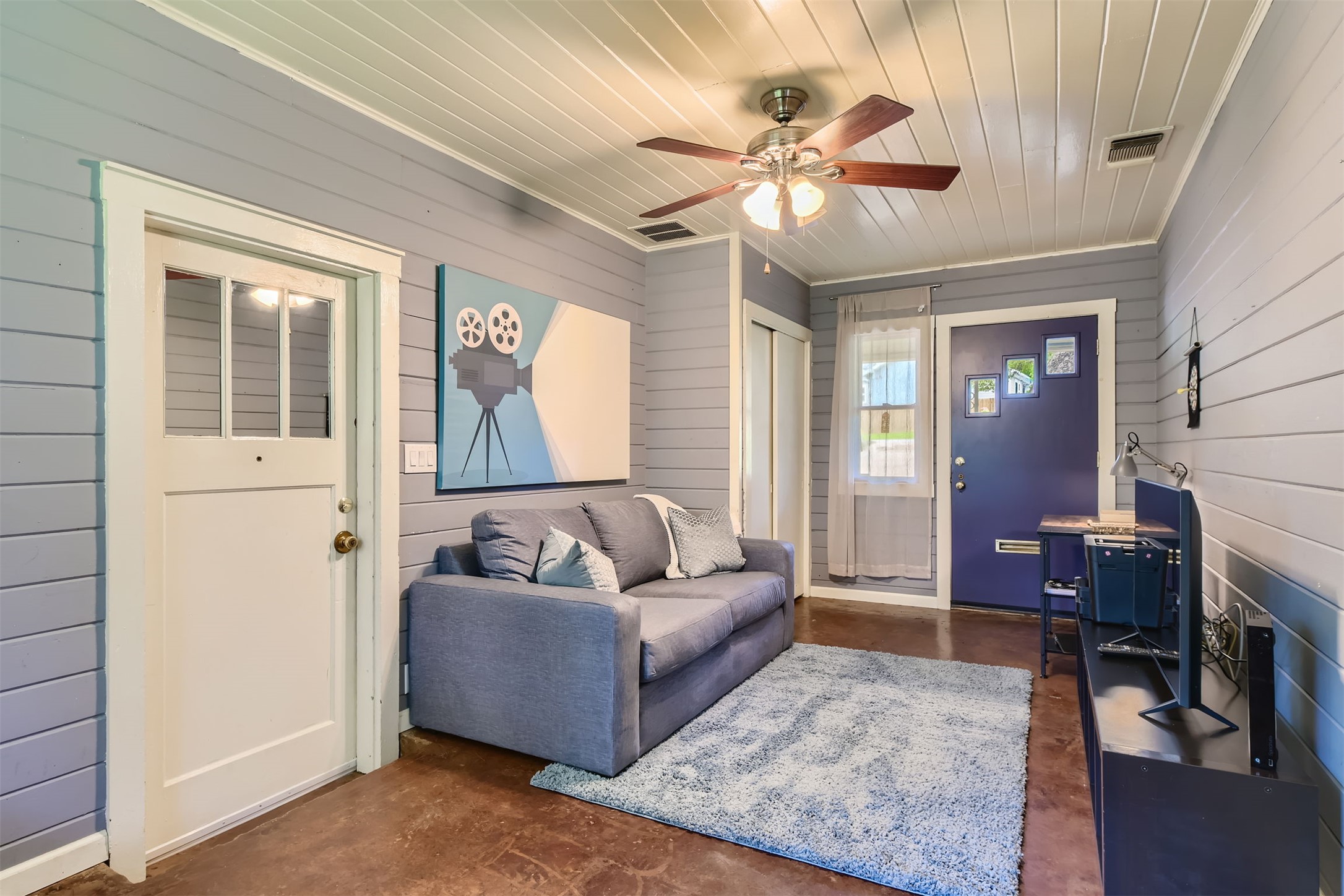 6804 Vine Street Austin, TX 78757 - Photo 8 of 15 a living room with furniture and a large window