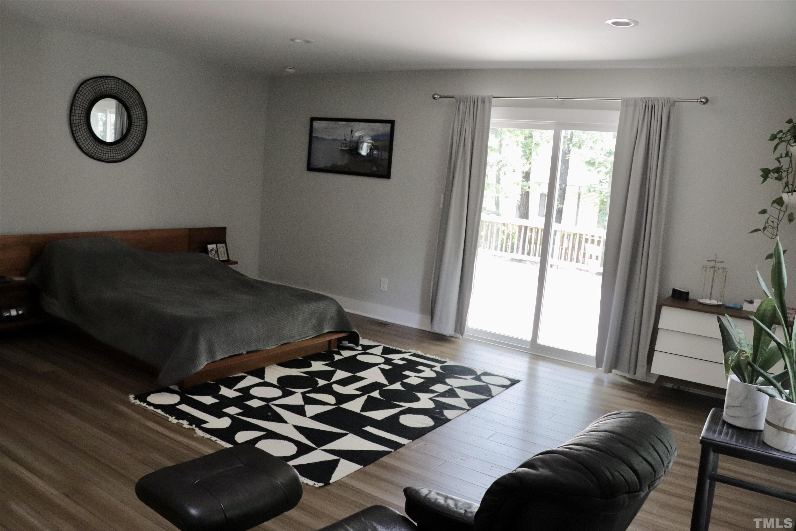 8001 Shellnut Road Raleigh, NC 27615 - Photo 11 of 22 a bedroom with a bed and a window