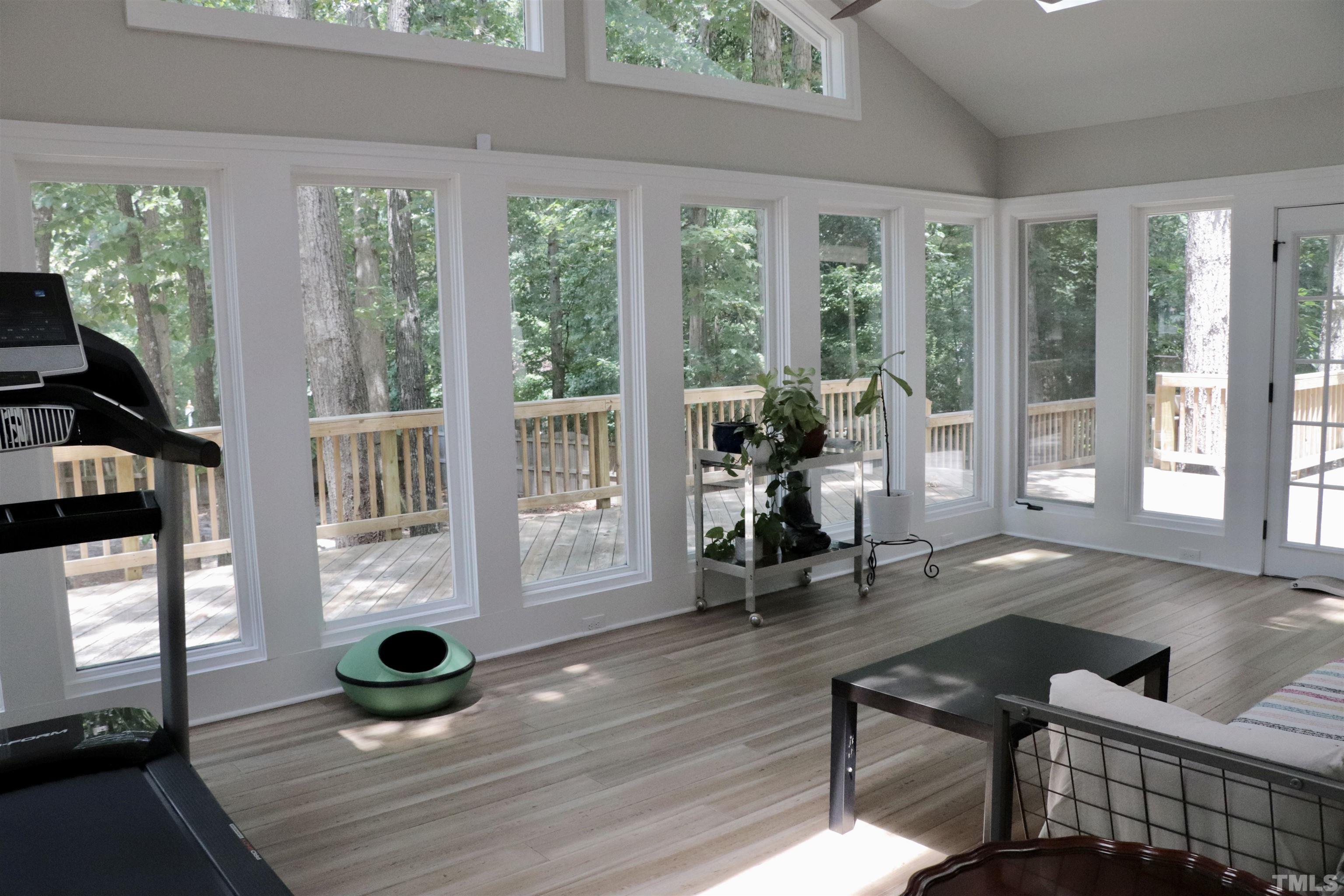 8001 Shellnut Road Raleigh, NC 27615 - Photo 18 of 22 a living room with furniture and a large window