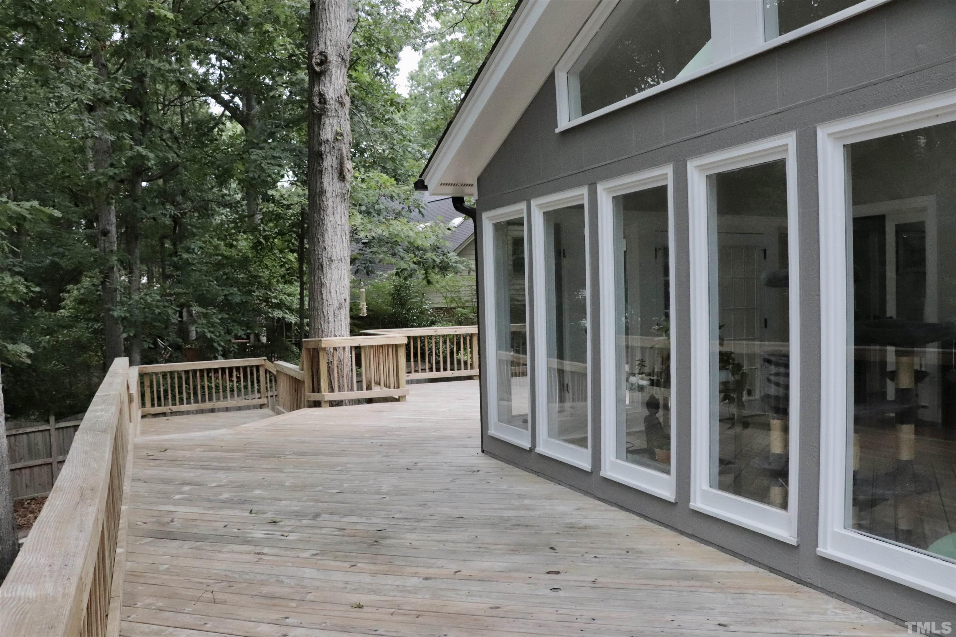 8001 Shellnut Road Raleigh, NC 27615 - Photo 19 of 22 a view of a house with backyard