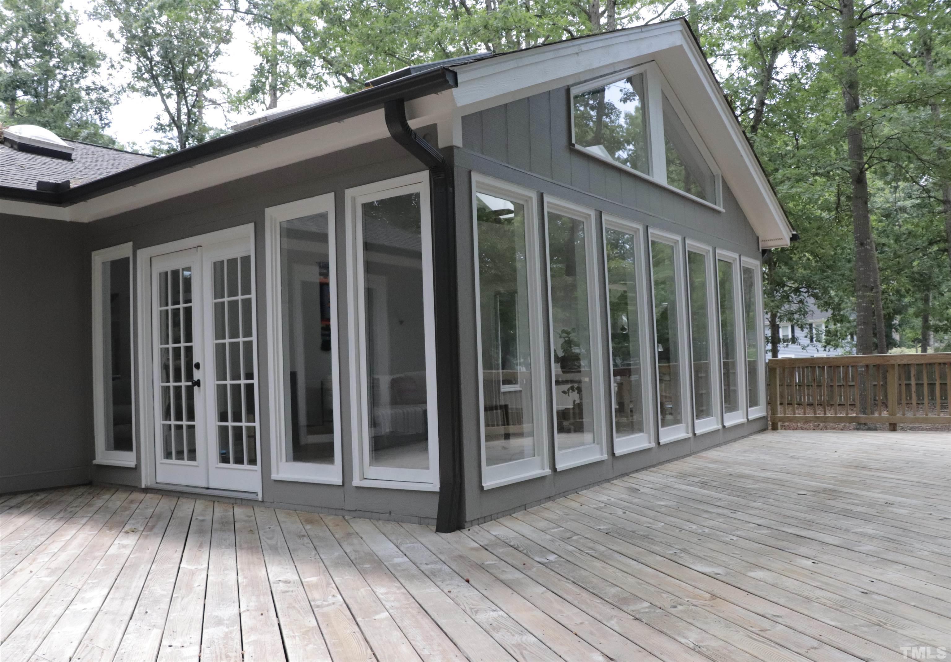 8001 Shellnut Road Raleigh, NC 27615 - Photo 20 of 22 a view of a house with a porch