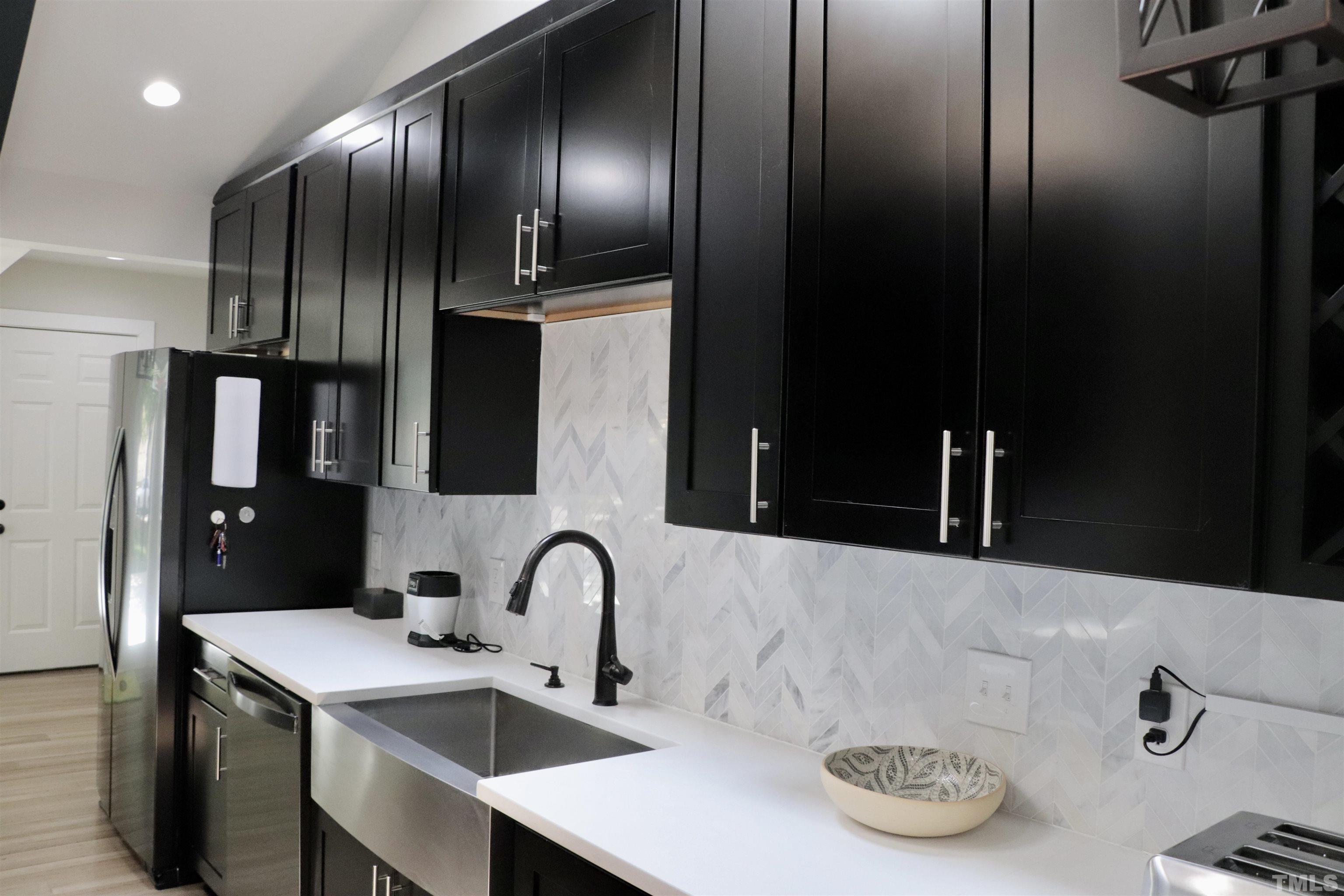 8001 Shellnut Road Raleigh, NC 27615 - Photo 10 of 22 a bathroom with a sink and a mirror