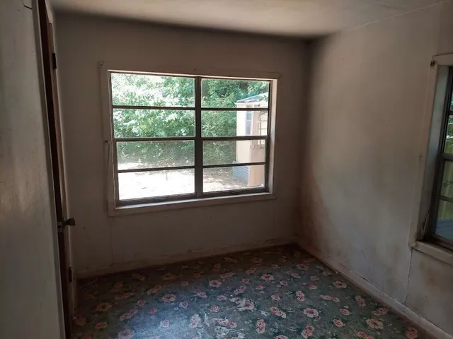 an empty room with a window