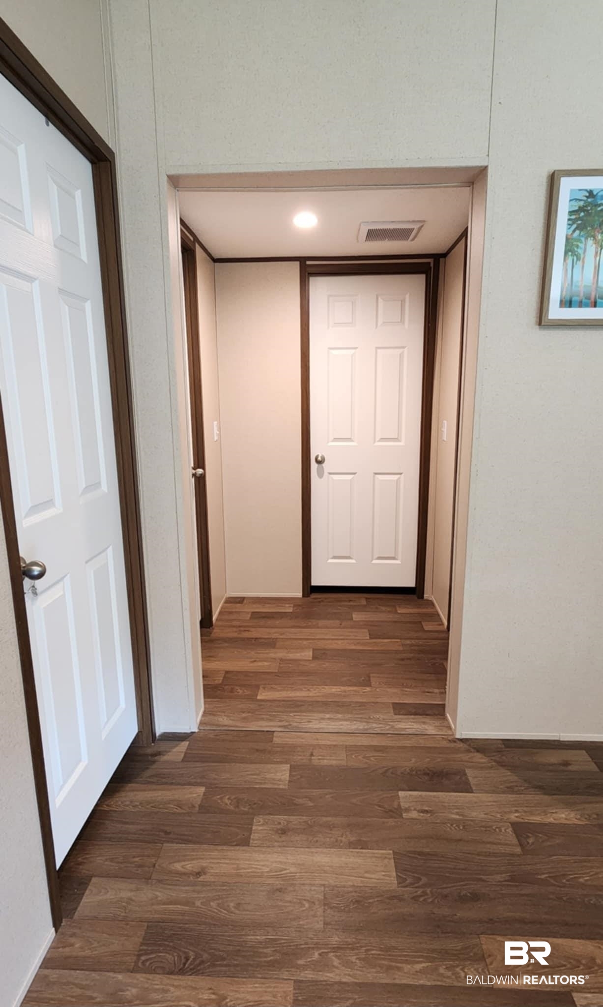 25474 Waterworld Road Robertsdale, AL 36567 - Photo 15 of 30 Hall featuring dark wood finished floors