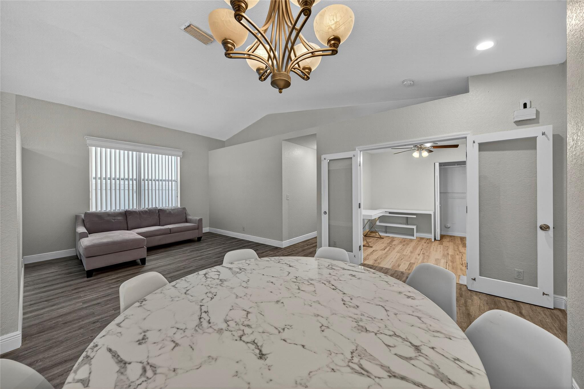 2424 Southwest 162nd Avenue Miramar, FL 33027 - Photo 13 of 44 a bedroom with a bed couch and window