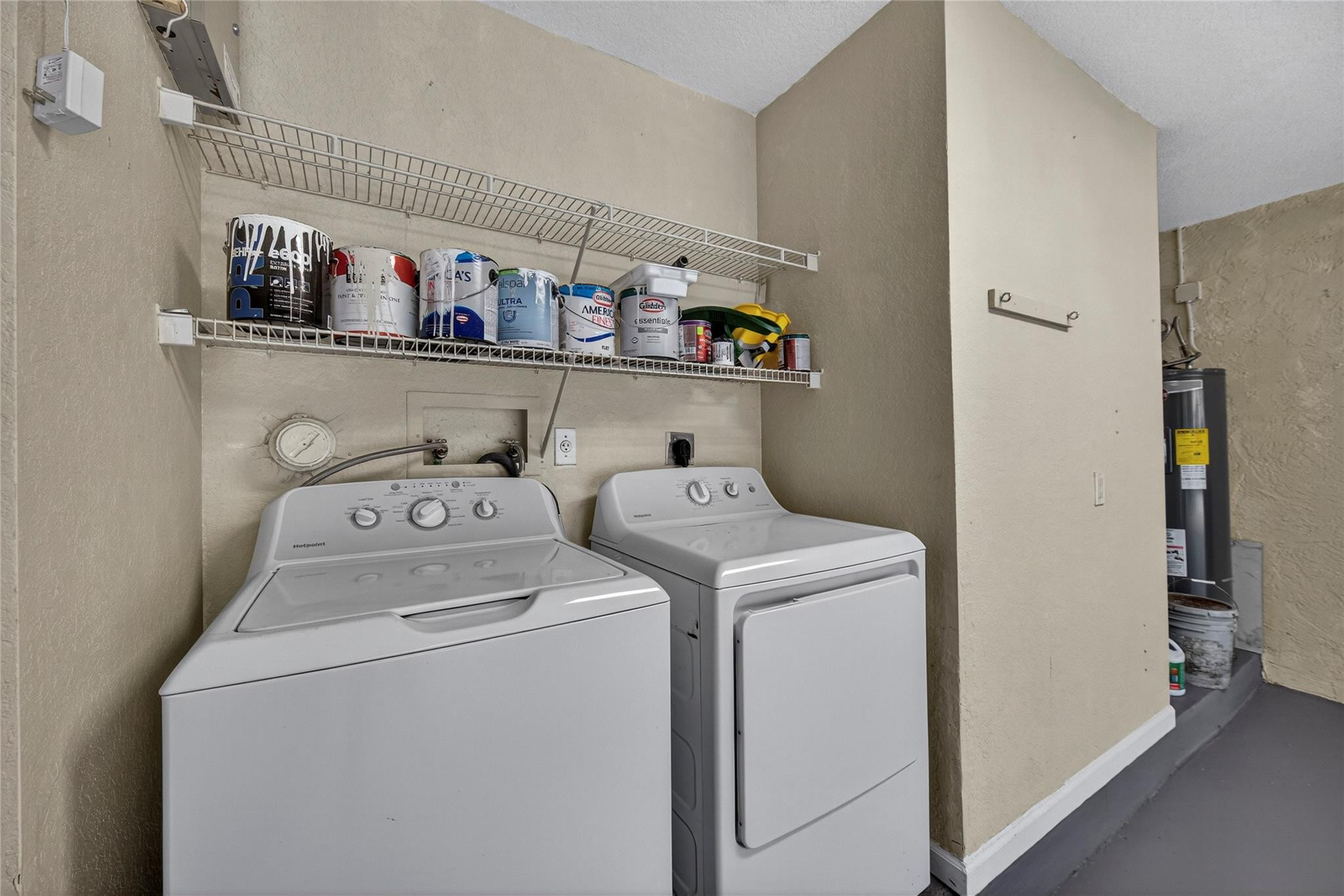 2424 Southwest 162nd Avenue Miramar, FL 33027 - Photo 42 of 44 a view of storage and utility room with washer and dryer