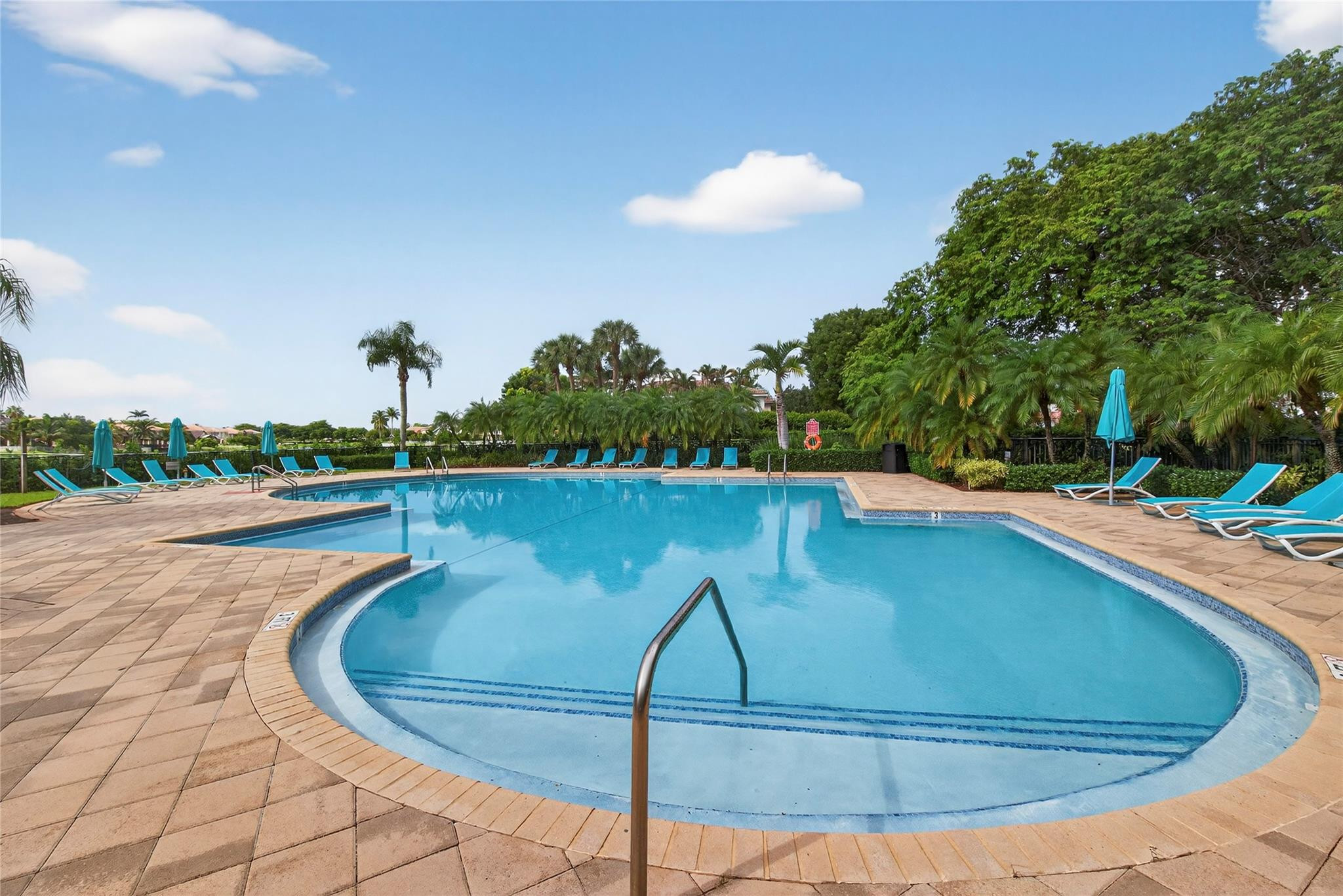 2424 Southwest 162nd Avenue Miramar, FL 33027 - Photo 44 of 44 a view of a swimming pool with a yard