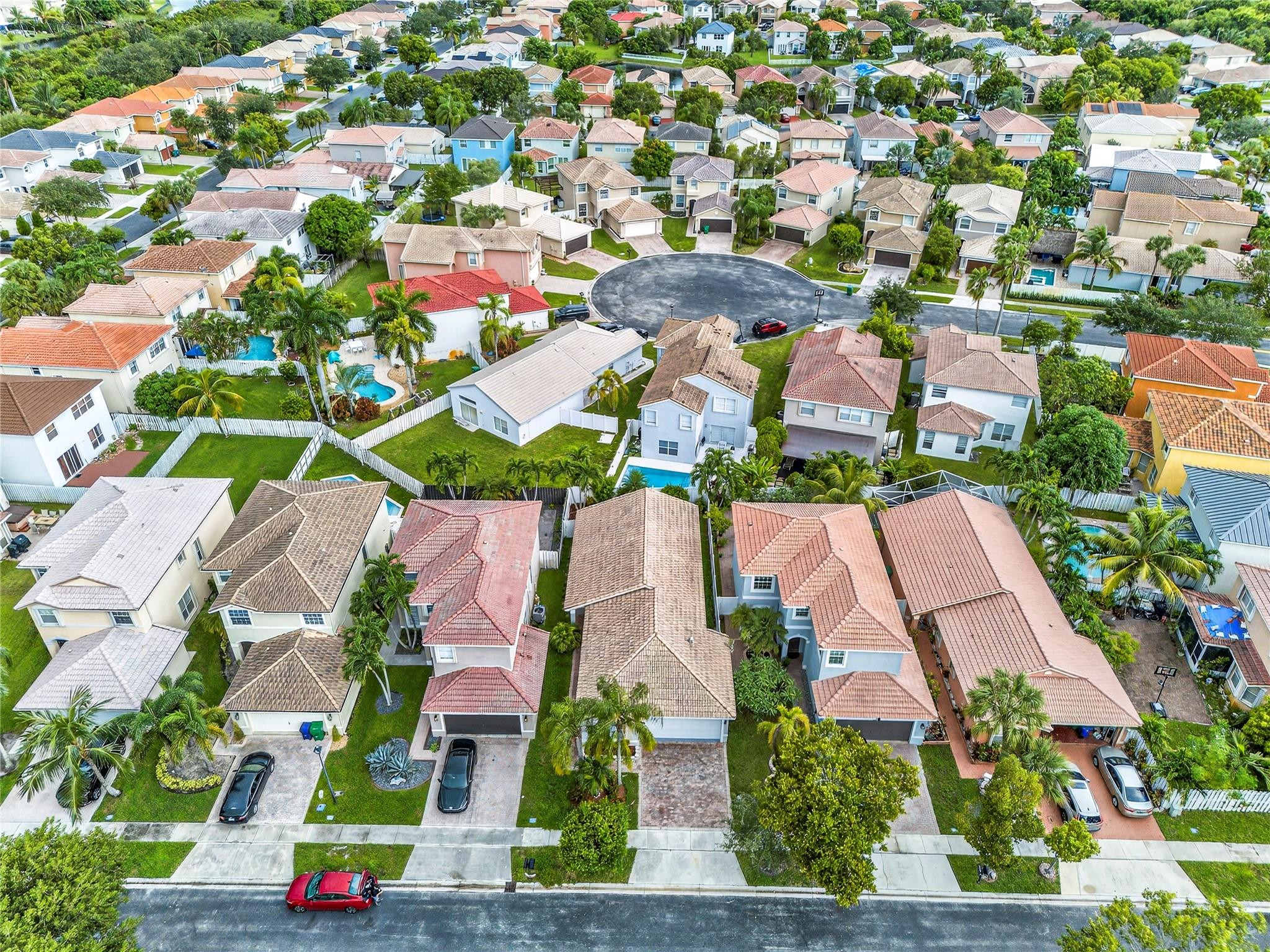 2424 Southwest 162nd Avenue Miramar, FL 33027 - Photo 5 of 44 an aerial view of residential houses with outdoor space