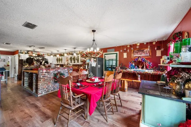 a view of a tables and chairs