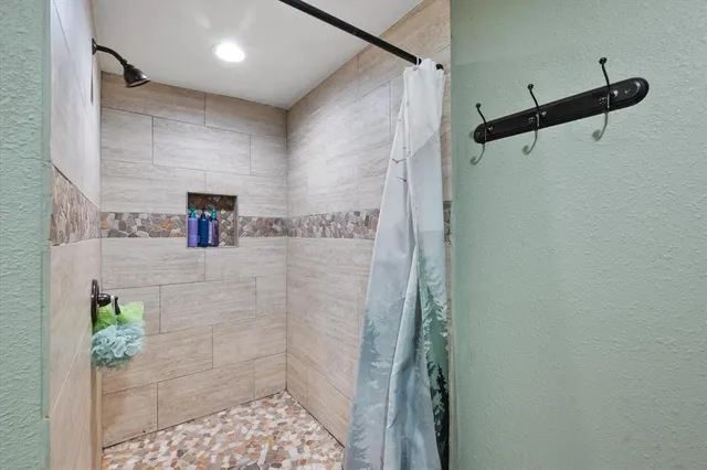 a view of a livingroom with furniture and workspace