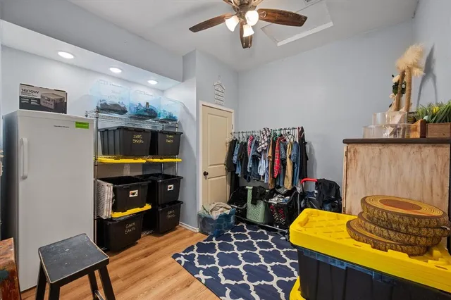 a view of a chairs and table in a patio