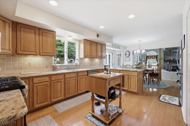 42 Copper Penny Road Flemington, NJ 08822 - Photo 16 of 39 a kitchen with table chairs sink and cabinets