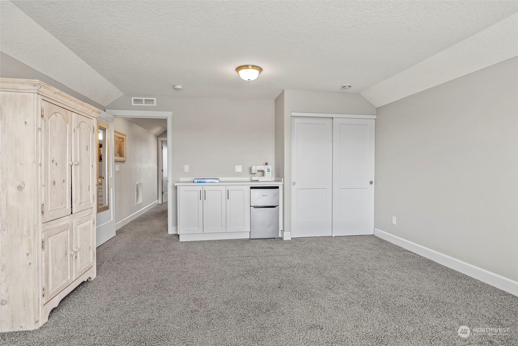 4578 North Noble Loop Ridgefield, WA 98642 - Photo 28 of 40 a view of cabinets and refrigerator
