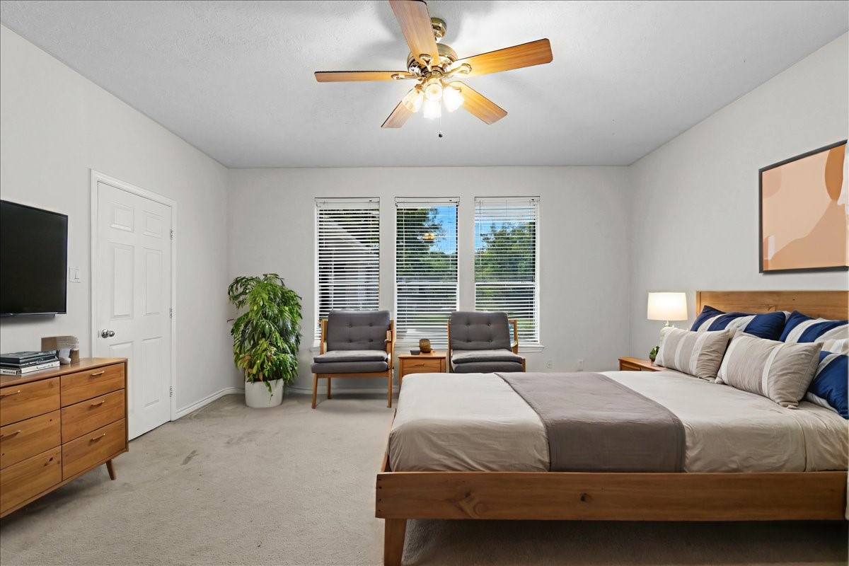 1607 Delta Lane Baytown, TX 77523 - Photo 24 of 48 Primary bedroom virtually staged.