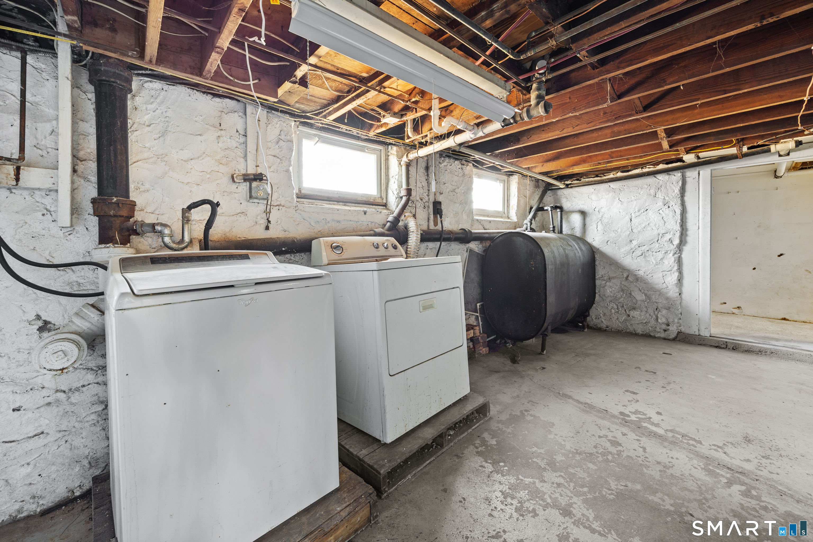 148 Burwell Road West Haven, CT 06516 - Photo 33 of 33 a utility room with dryer and washer