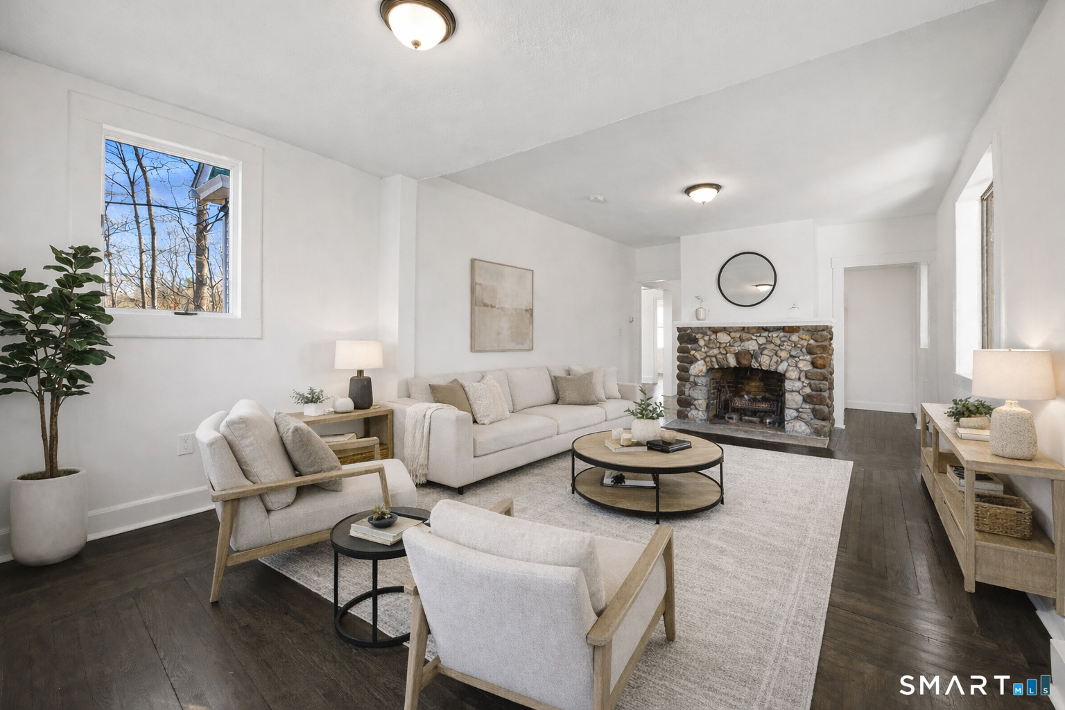 148 Burwell Road West Haven, CT 06516 - Photo 4 of 33 a living room with furniture and a fireplace