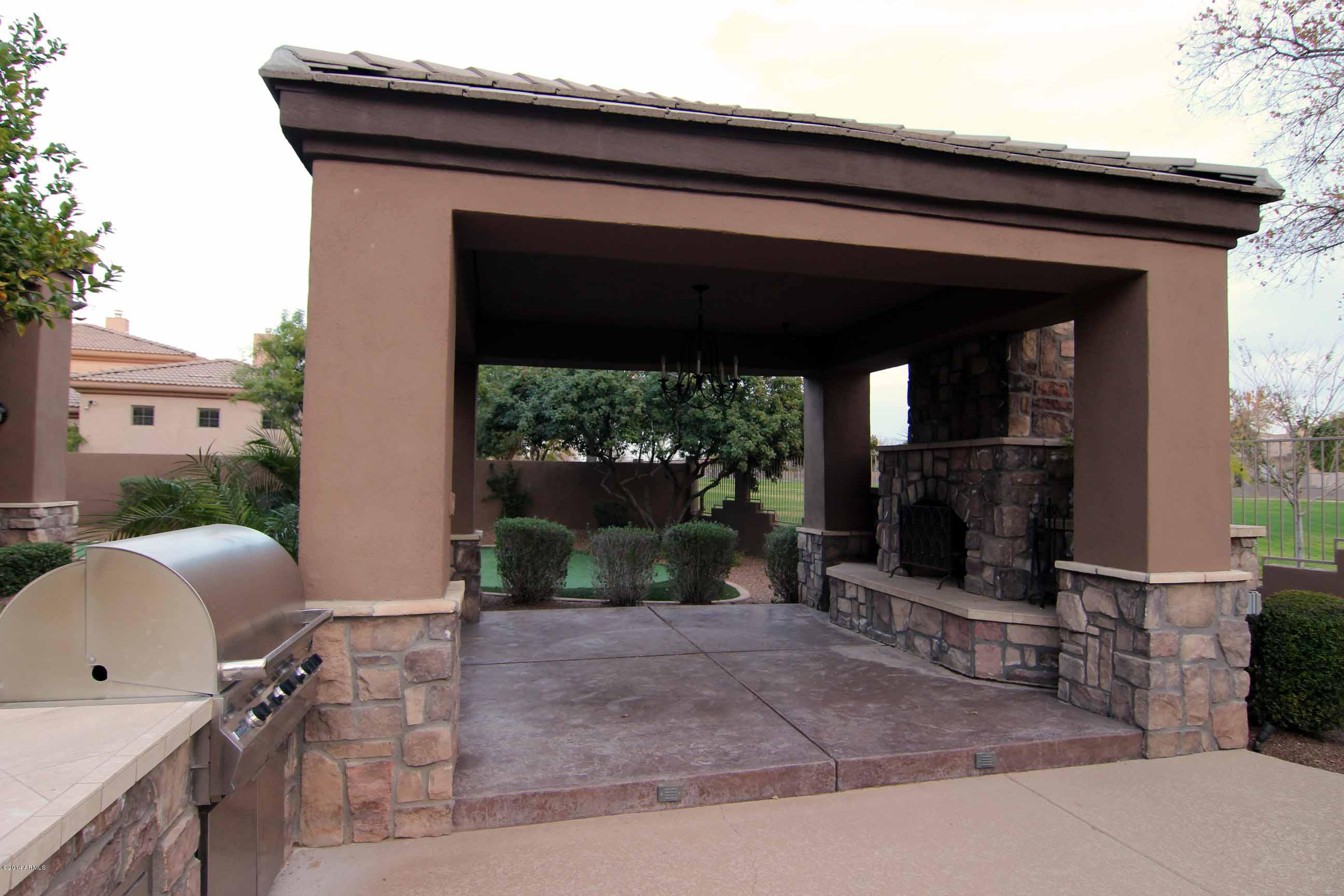 2959 East Bonanza Road Gilbert, AZ 85297 - Photo 46 of 49 Outdoor fireplace and BBQ