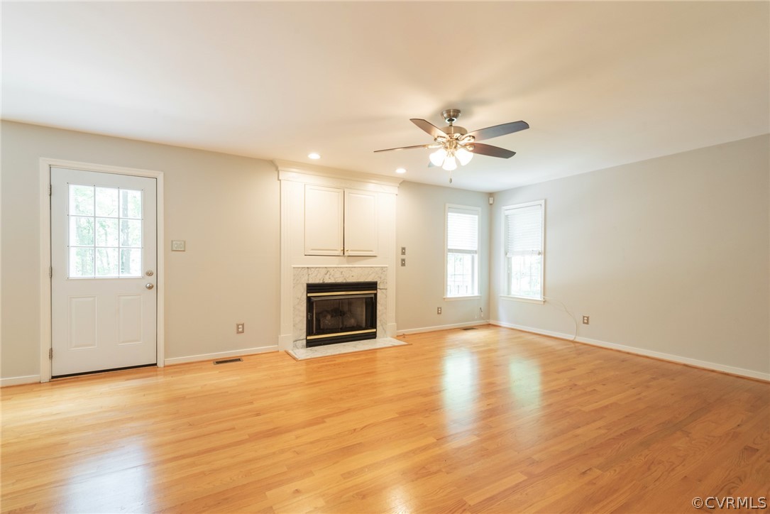 3206 Ludgate Road Chester, VA 23831 - Photo 32 of 45 a view of an empty room with window and wooden floor