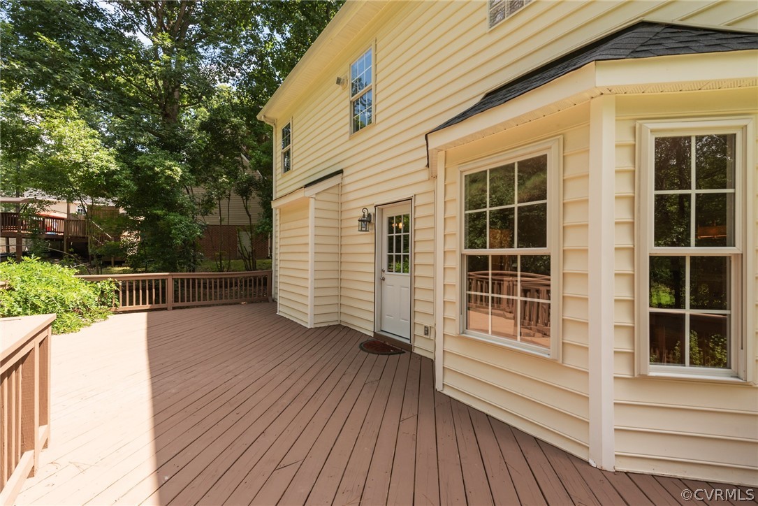 3206 Ludgate Road Chester, VA 23831 - Photo 6 of 45 a view of deck with a large window and wooden floor