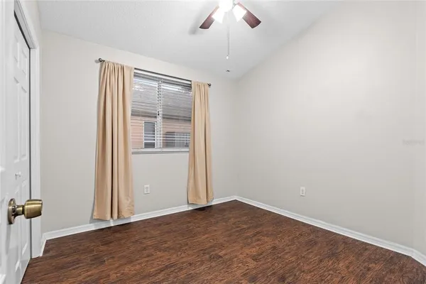 a view of a livingroom with furniture and wooden floor