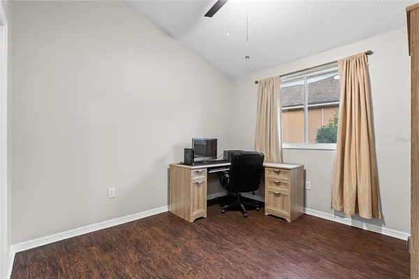 a kitchen with stainless steel appliances granite countertop a stove and a refrigerator