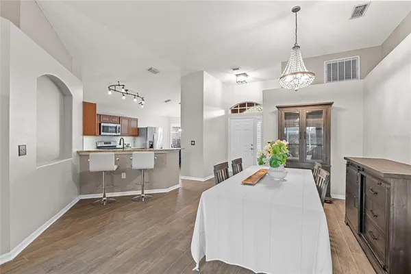 a view of a kitchen and dining room