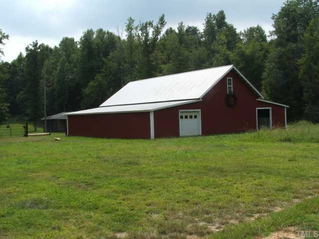 1055 Johnny Shaw Road Moncure, NC 27559 - Photo 3 of 12 Eight stall horse barn with storage area. Water and electric. Well 20 GPM