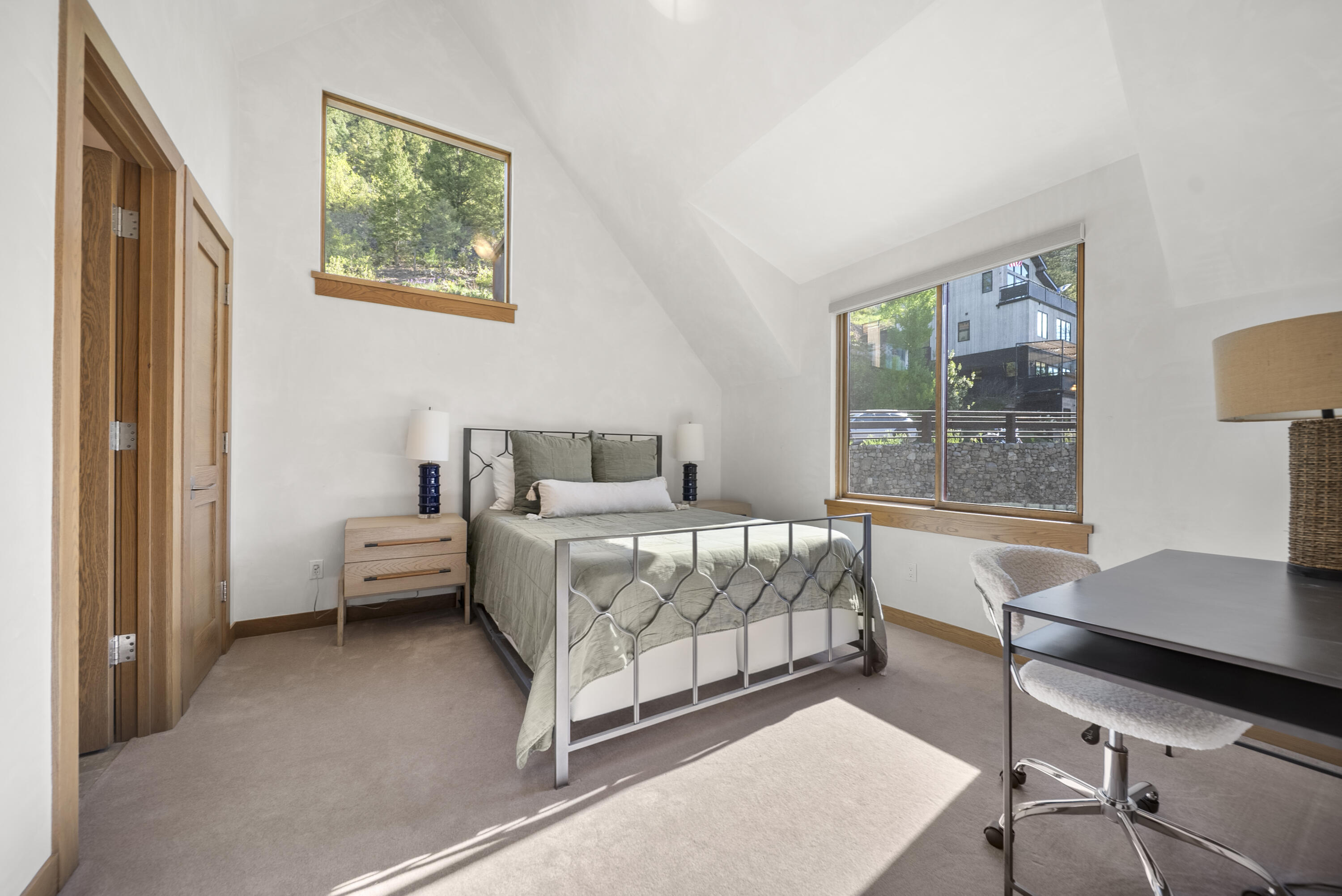 245 South Sunset Ridge Drive Telluride, CO 81435 - Photo 15 of 26 a bedroom with a bed and a desk