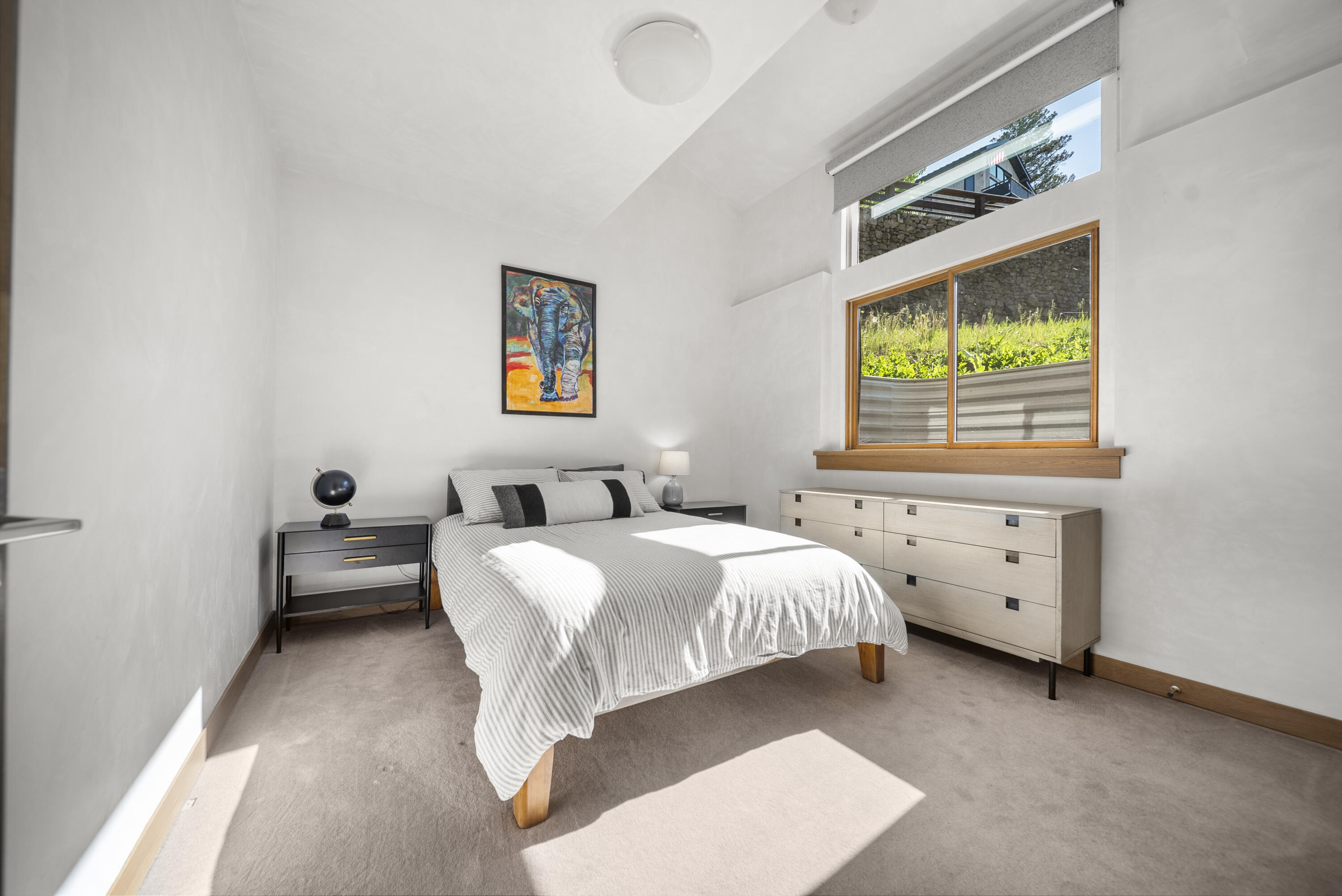 245 South Sunset Ridge Drive Telluride, CO 81435 - Photo 17 of 26 a bedroom with a bed and a couch