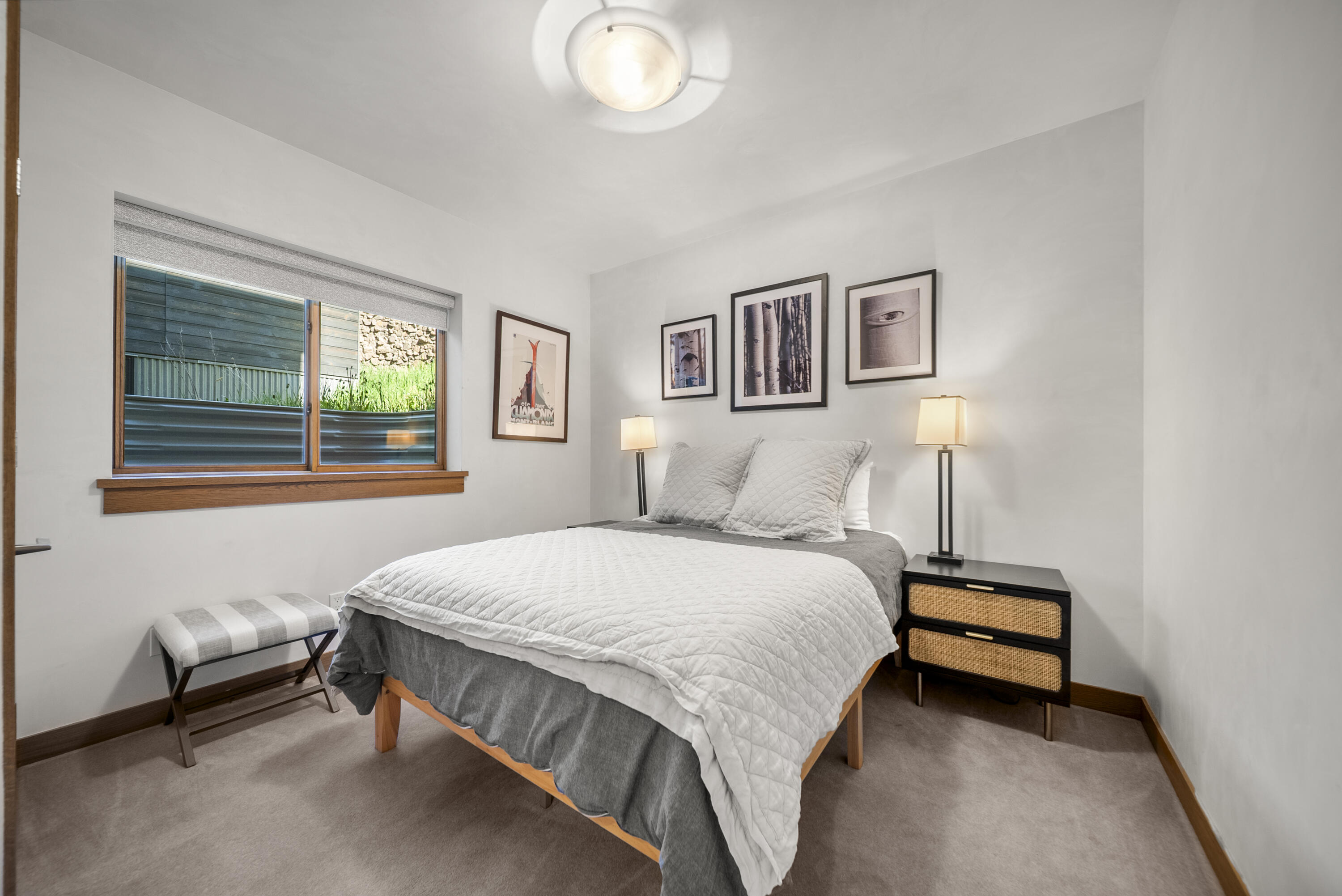 245 South Sunset Ridge Drive Telluride, CO 81435 - Photo 19 of 26 a bedroom with a bed and a window