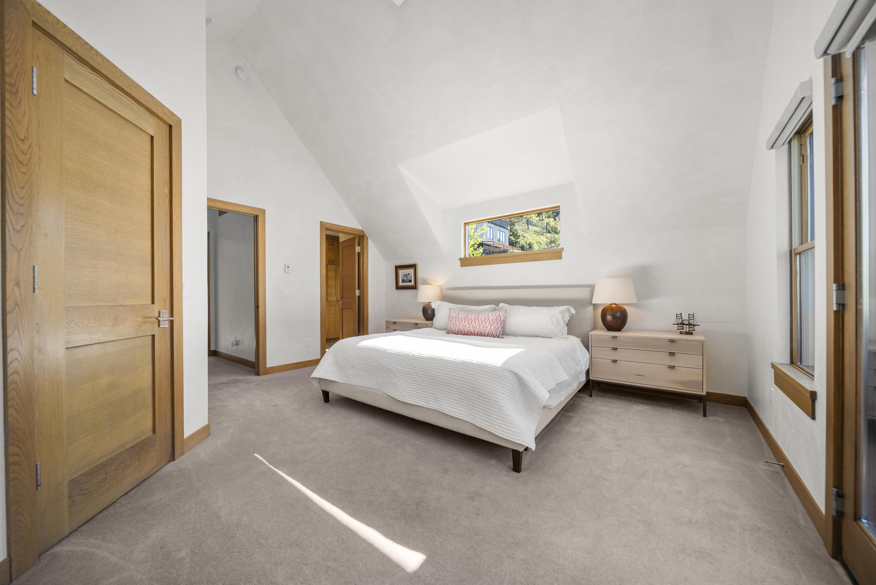 245 South Sunset Ridge Drive Telluride, CO 81435 - Photo 10 of 26 a bedroom with a bed and a window