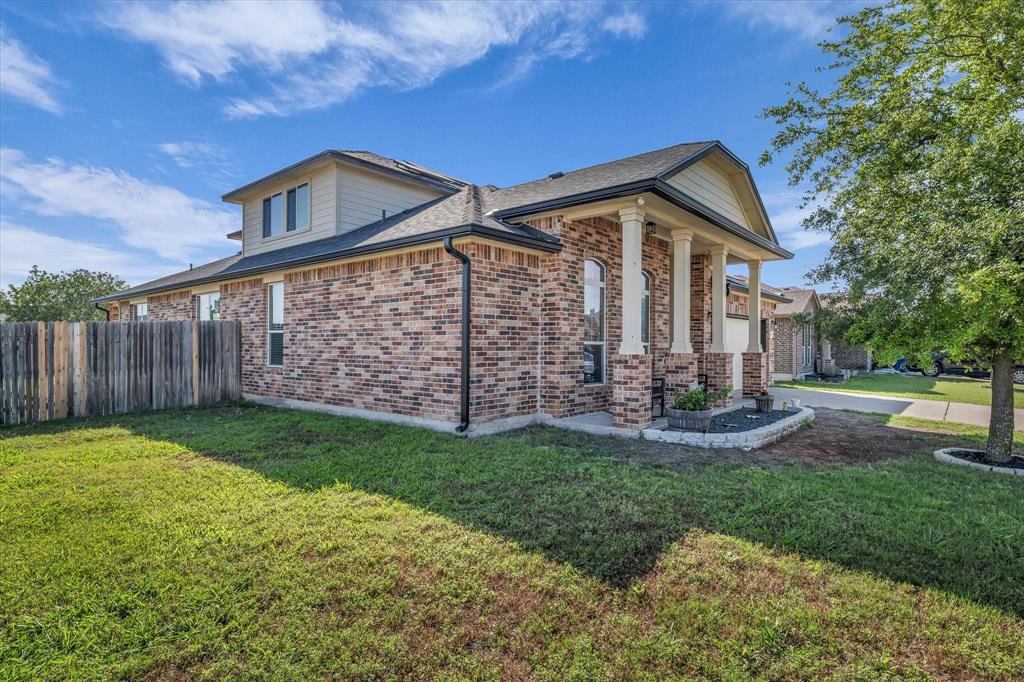 9453 Centennial Drive Waco, TX 76708 - Photo 4 of 37 a front view of house with yard and green space