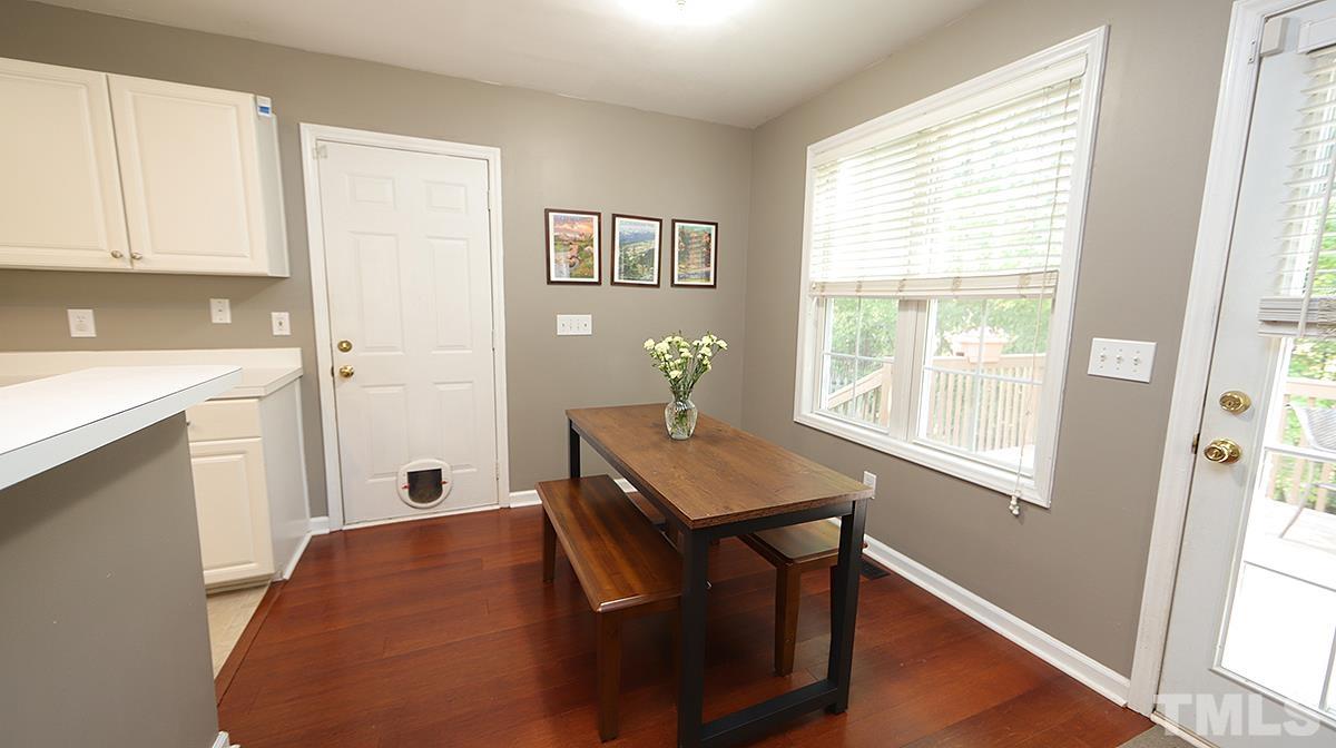 8604 Clivedon Drive Raleigh, NC 27615 - Photo 8 of 16 a room with chair and window