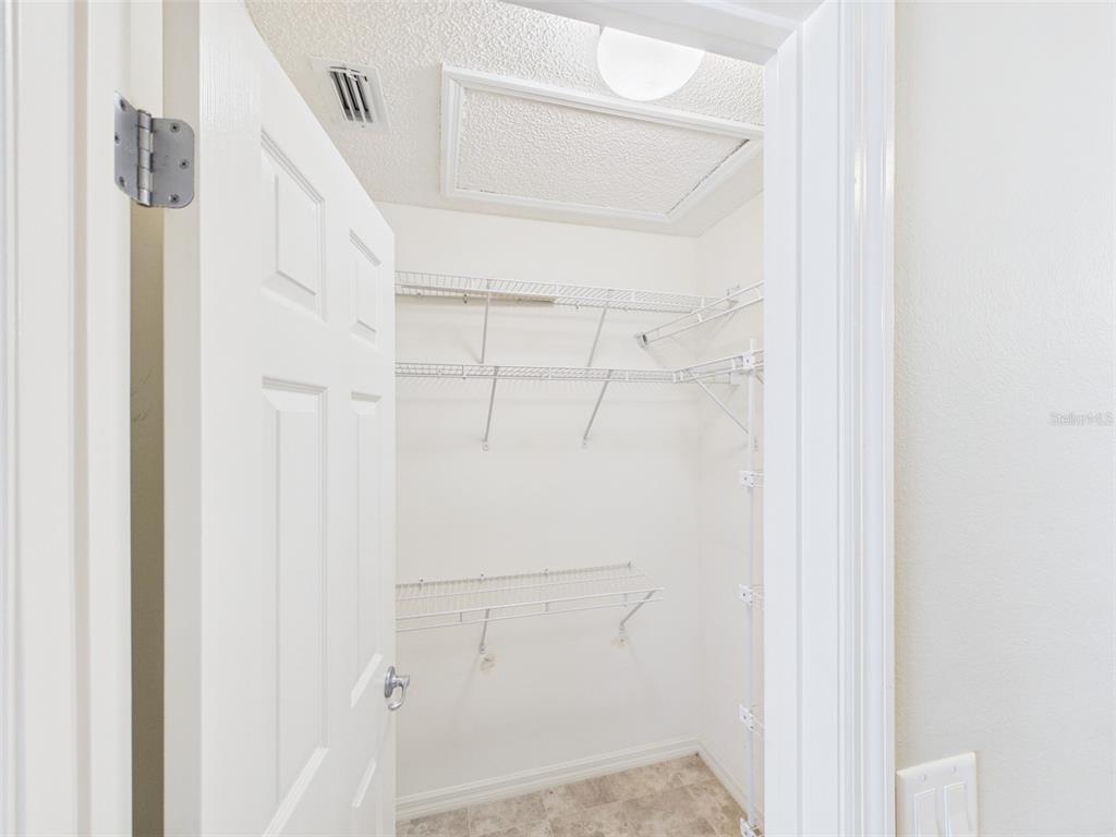 2297 Welcome Way The Villages, FL 32162 - Photo 25 of 36 a view of walk in closet