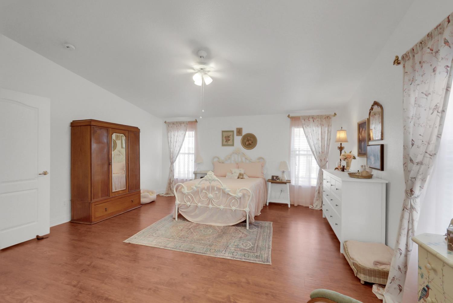 1459 Standiford, Unit 92 Modesto, CA 95350 - Photo 11 of 19 a living room with furniture and a wooden floor