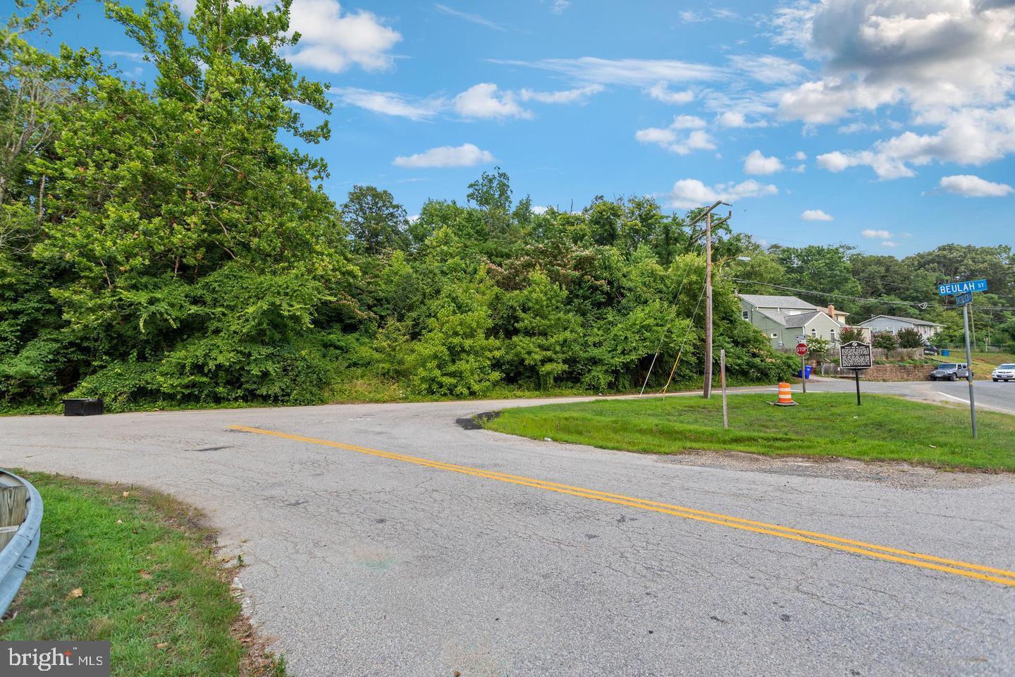 9005 Backlick Road Fort Belvoir, VA 22060 - Photo 14 of 25 a view of road with a big yard