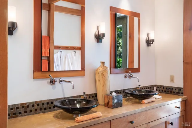 a kitchen with stainless steel appliances a stove and a refrigerator