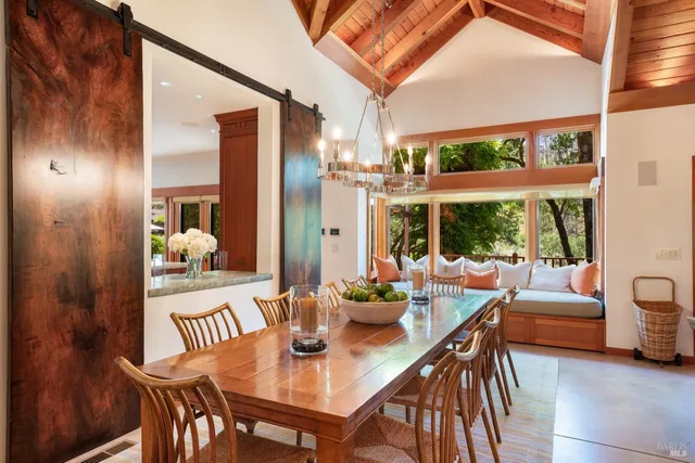 a kitchen with a refrigerator and sink