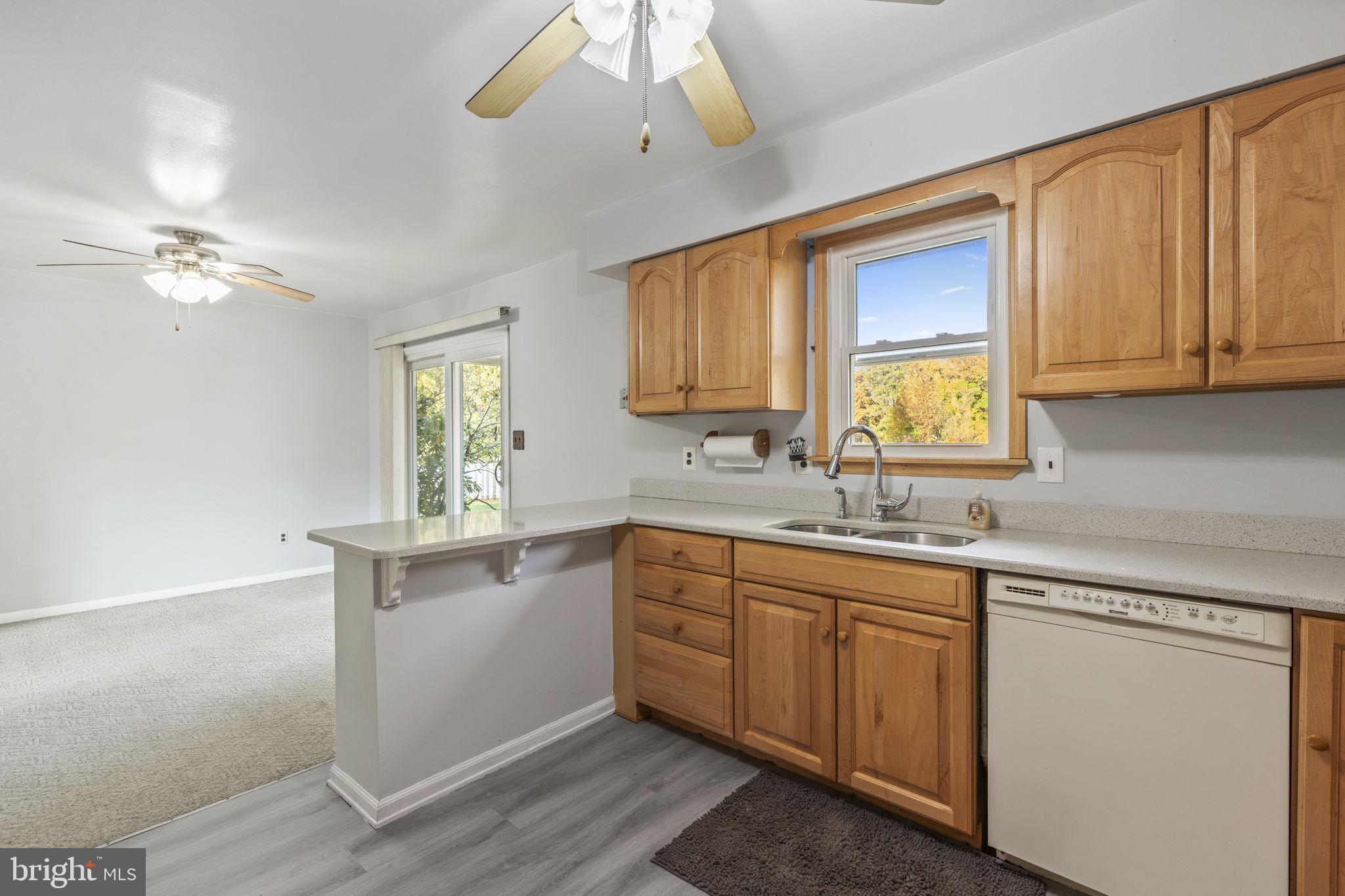 413 Magnolia Road Edgewood, MD 21040 - Photo 13 of 49 a kitchen with a sink cabinets and window