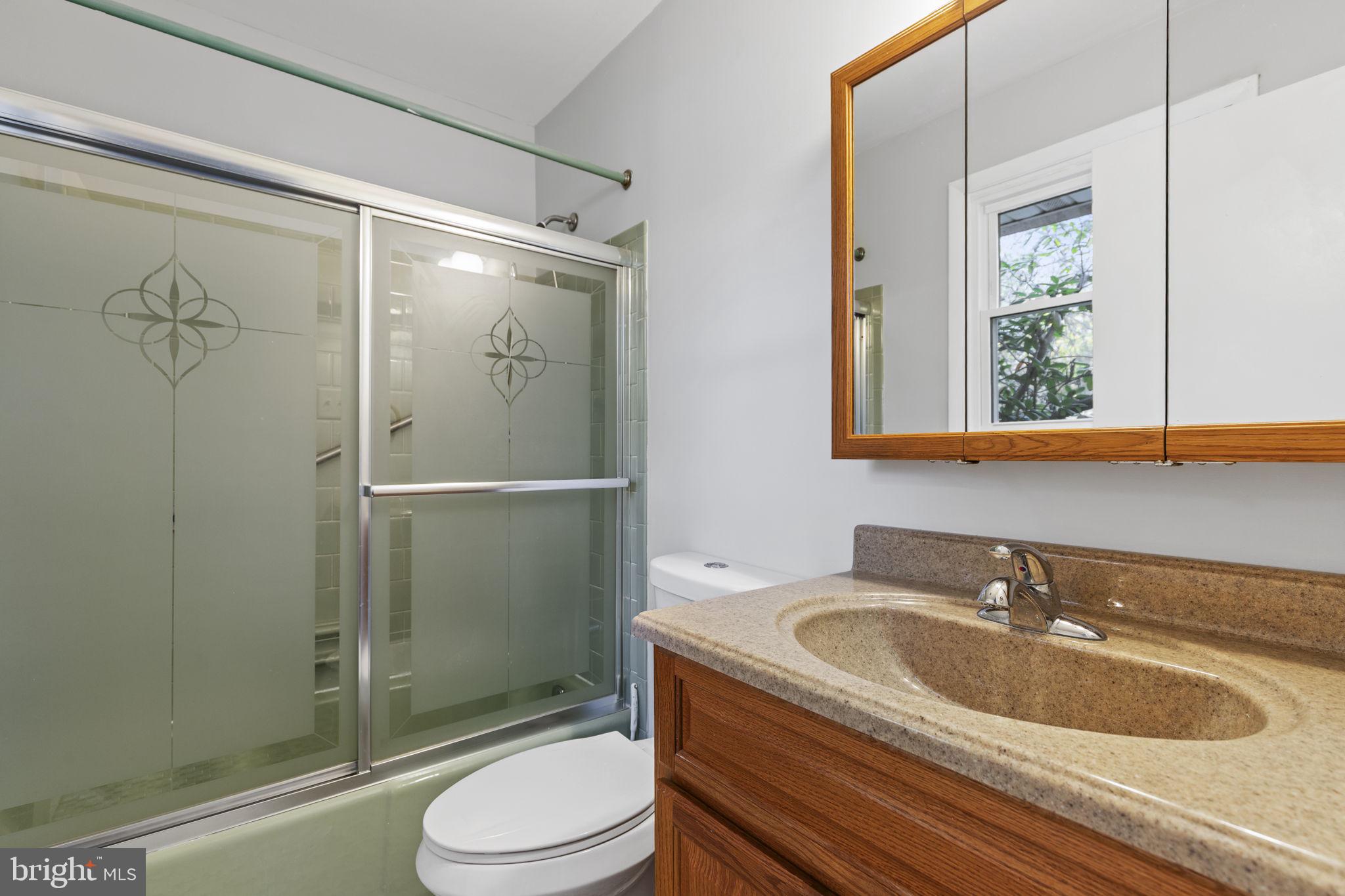 413 Magnolia Road Edgewood, MD 21040 - Photo 26 of 49 a bathroom with a sink a toilet and shower