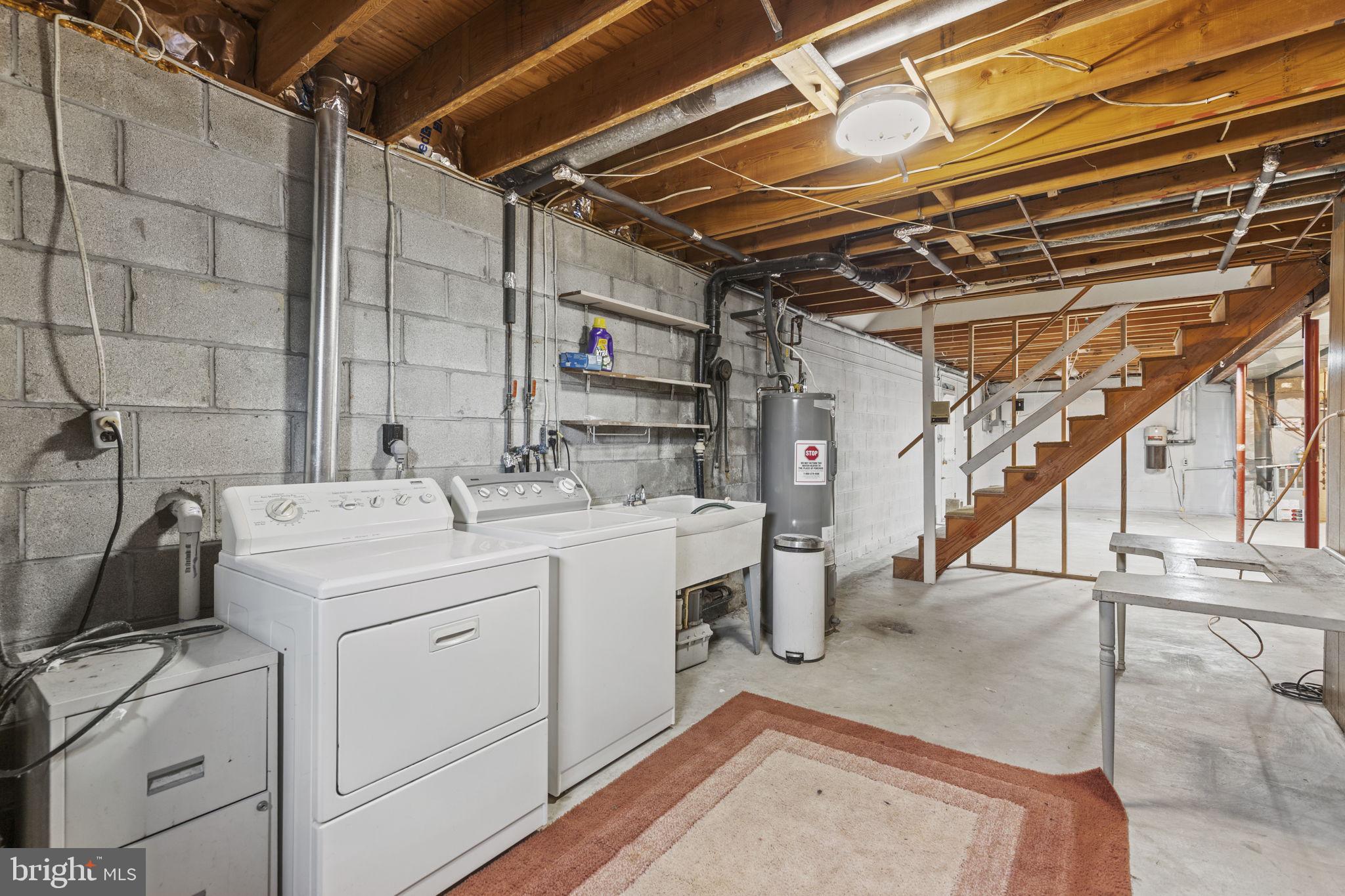 413 Magnolia Road Edgewood, MD 21040 - Photo 28 of 49 a utility room with dryer and washer
